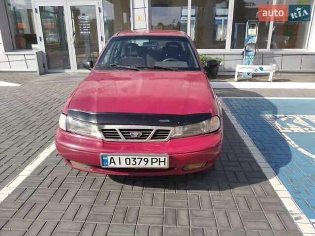 Червоний Деу Нексія, об'ємом двигуна 1.5 л та пробігом 400 тис. км за 1304 $, фото 1 на Automoto.ua