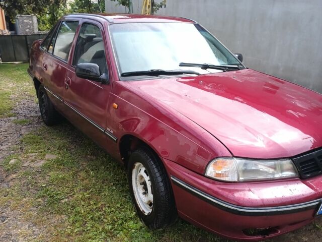 Червоний Деу Нексія, об'ємом двигуна 1.5 л та пробігом 145 тис. км за 789 $, фото 1 на Automoto.ua