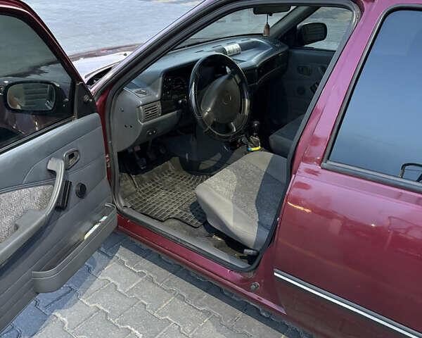 Червоний Деу Нексія, об'ємом двигуна 1.5 л та пробігом 115 тис. км за 2100 $, фото 9 на Automoto.ua