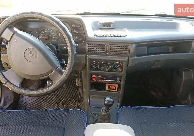 Червоний Деу Нексія, об'ємом двигуна 1.5 л та пробігом 221 тис. км за 1650 $, фото 7 на Automoto.ua