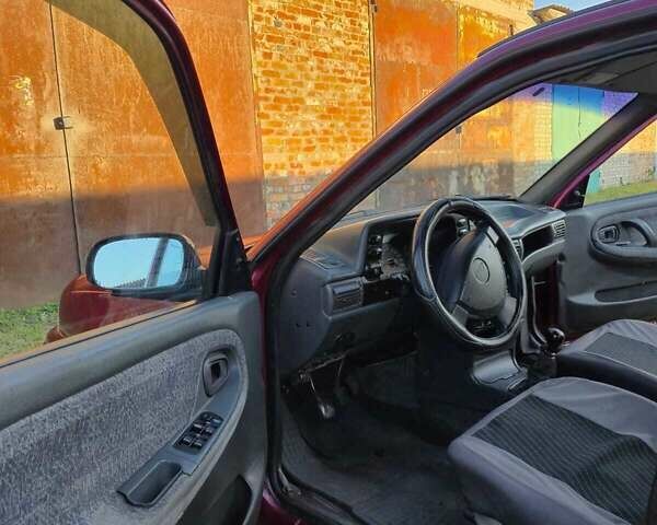 Деу Нексія 2008 у Конотопе на Automoto.ua Червоний Деу Нексія, об'ємом двигуна 1.5 л та пробігом 148 тис. км за 2100 $, фото 19 на Automoto.ua
