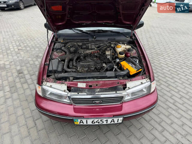 Червоний Деу Нексія, об'ємом двигуна 1.5 л та пробігом 224 тис. км за 2200 $, фото 11 на Automoto.ua