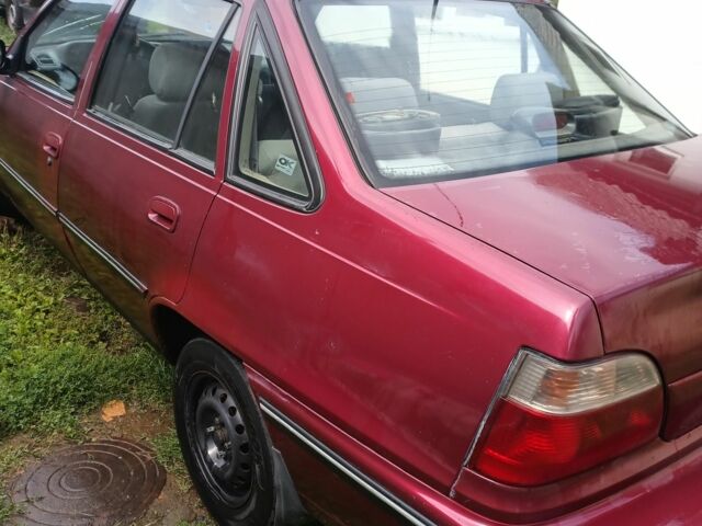 Червоний Деу Нексія, об'ємом двигуна 1.5 л та пробігом 145 тис. км за 789 $, фото 3 на Automoto.ua