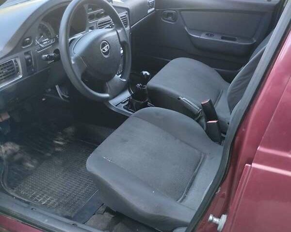 Червоний Деу Нексія, об'ємом двигуна 1.6 л та пробігом 142 тис. км за 1589 $, фото 1 на Automoto.ua