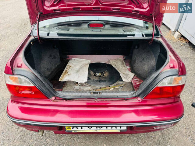 Червоний Деу Нексія, об'ємом двигуна 1.5 л та пробігом 224 тис. км за 2200 $, фото 10 на Automoto.ua
