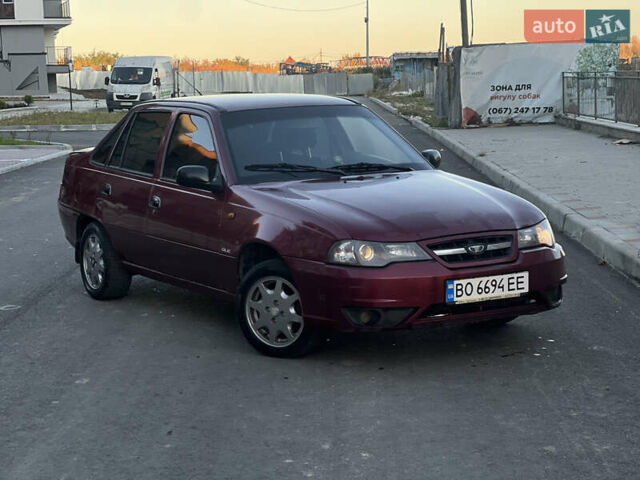 Красный Дэу Нексия, объемом двигателя 1.6 л и пробегом 240 тыс. км за 1200 $, фото 3 на Automoto.ua