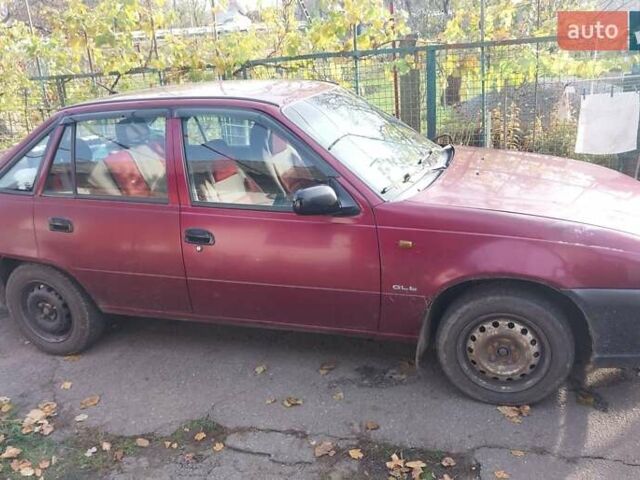 Червоний Деу Нексія, об'ємом двигуна 1.5 л та пробігом 235 тис. км за 1700 $, фото 2 на Automoto.ua