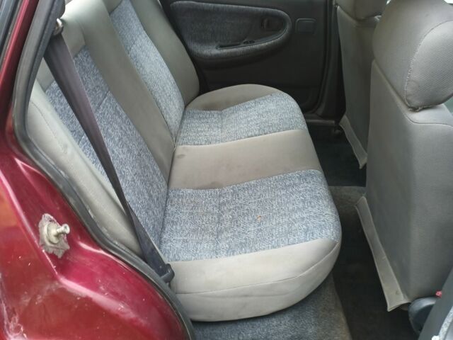 Червоний Деу Нексія, об'ємом двигуна 1.5 л та пробігом 145 тис. км за 789 $, фото 6 на Automoto.ua