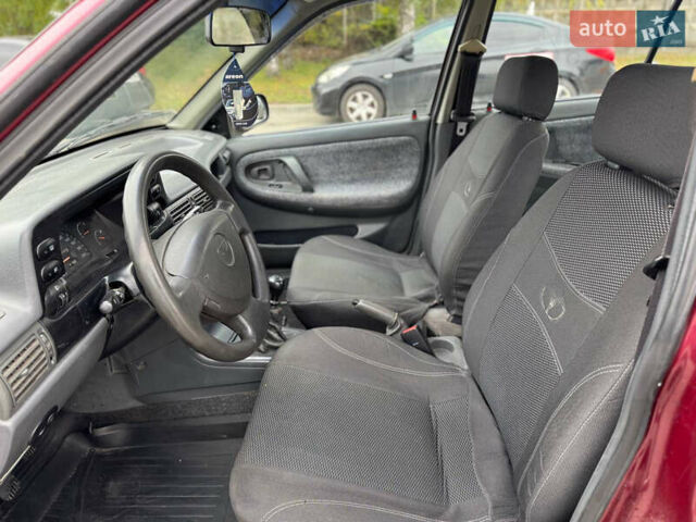 Дэу Нексия 2008 в Белой Церкве на Automoto.ua Красный Дэу Нексия, объемом двигателя 1.5 л и пробегом 224 тыс. км за 2450 $, фото 11 на Automoto.ua