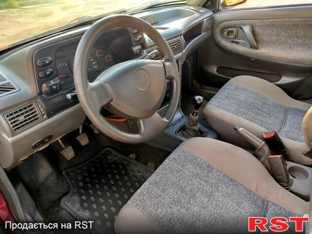 Красный Дэу Нексия, объемом двигателя 1.5 л и пробегом 320 тыс. км за 1500 $, фото 6 на Automoto.ua