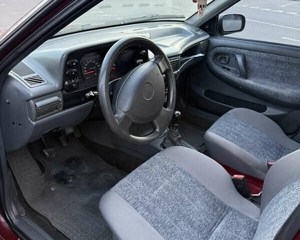 Красный Дэу Нексия, объемом двигателя 1.5 л и пробегом 338 тыс. км за 2300 $, фото 8 на Automoto.ua