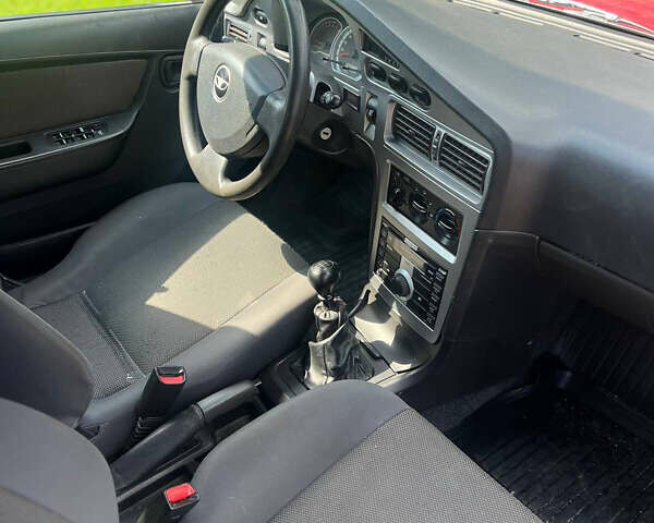 Красный Дэу Нексия, объемом двигателя 1.6 л и пробегом 162 тыс. км за 2100 $, фото 18 на Automoto.ua