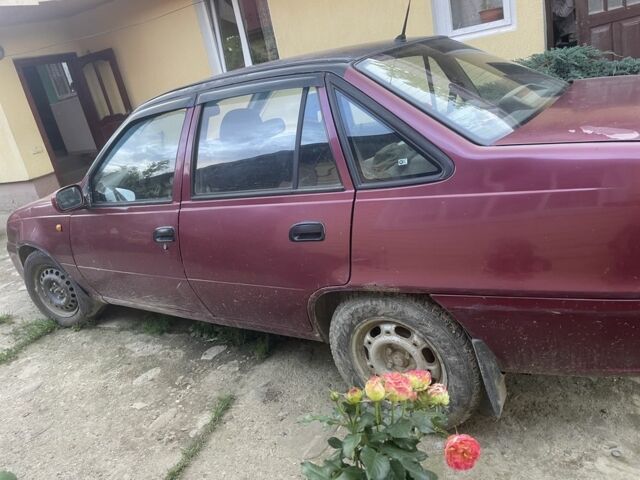 Красный Дэу Нексия, объемом двигателя 1.5 л и пробегом 276 тыс. км за 1100 $, фото 3 на Automoto.ua