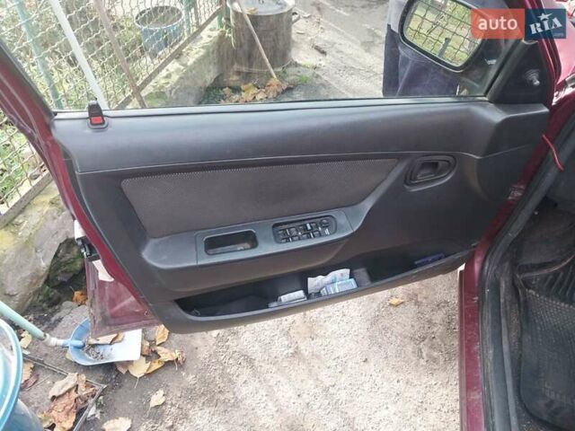 Червоний Деу Нексія, об'ємом двигуна 1.5 л та пробігом 235 тис. км за 1700 $, фото 5 на Automoto.ua