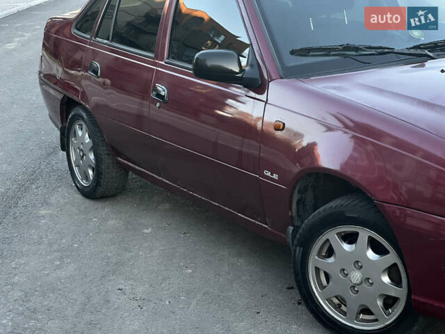 Красный Дэу Нексия, объемом двигателя 1.6 л и пробегом 240 тыс. км за 1200 $, фото 6 на Automoto.ua