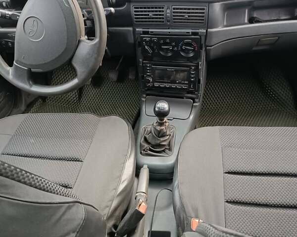 Червоний Деу Нексія, об'ємом двигуна 1.5 л та пробігом 111 тис. км за 1400 $, фото 7 на Automoto.ua