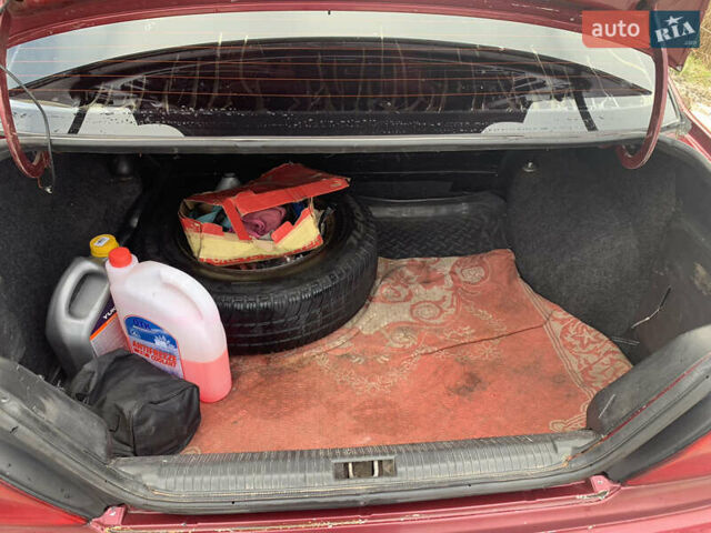 Червоний Деу Нексія, об'ємом двигуна 1.5 л та пробігом 305 тис. км за 1450 $, фото 6 на Automoto.ua