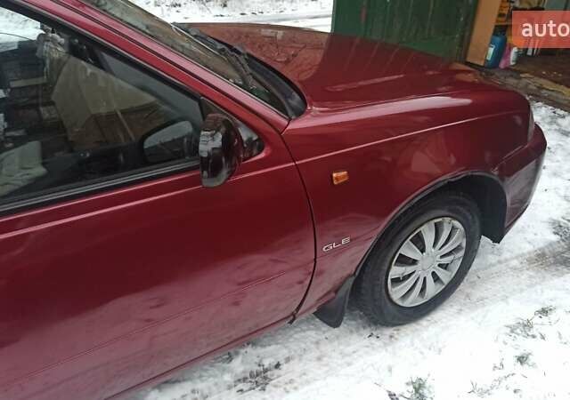 Красный Дэу Нексия, объемом двигателя 1.5 л и пробегом 265 тыс. км за 2500 $, фото 2 на Automoto.ua