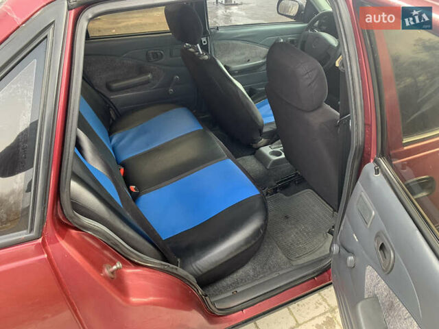 Червоний Деу Нексія, об'ємом двигуна 1.5 л та пробігом 305 тис. км за 1450 $, фото 8 на Automoto.ua