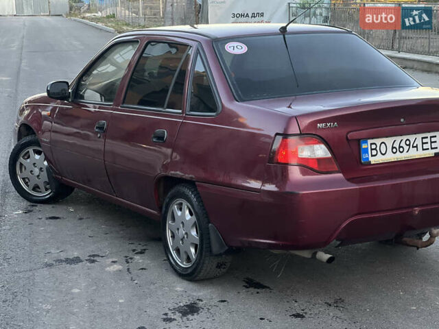 Красный Дэу Нексия, объемом двигателя 1.6 л и пробегом 240 тыс. км за 1200 $, фото 14 на Automoto.ua