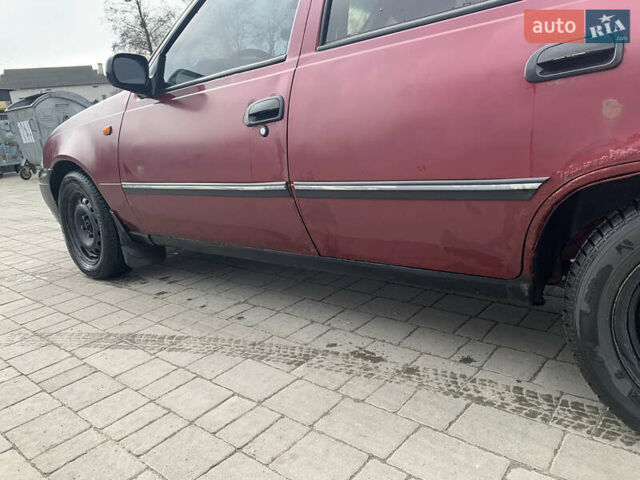 Червоний Деу Нексія, об'ємом двигуна 1.5 л та пробігом 305 тис. км за 1450 $, фото 3 на Automoto.ua