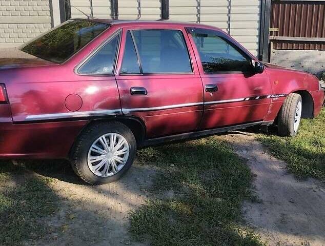 Червоний Деу Нексія, об'ємом двигуна 1.6 л та пробігом 142 тис. км за 1589 $, фото 3 на Automoto.ua