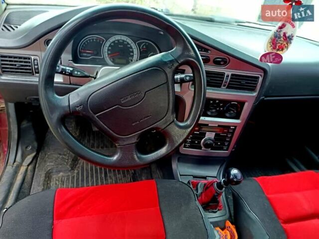 Красный Дэу Нексия, объемом двигателя 1.5 л и пробегом 180 тыс. км за 2300 $, фото 5 на Automoto.ua
