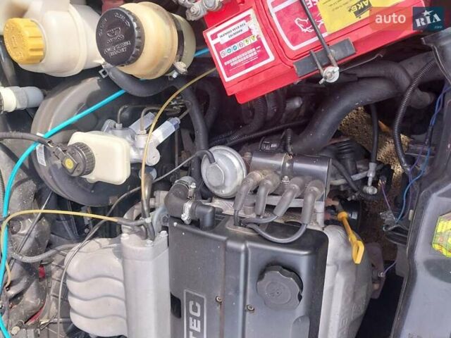 Червоний Деу Нексія, об'ємом двигуна 1.5 л та пробігом 235 тис. км за 1700 $, фото 9 на Automoto.ua