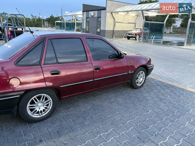 Червоний Деу Нексія, об'ємом двигуна 1.5 л та пробігом 115 тис. км за 2100 $, фото 6 на Automoto.ua