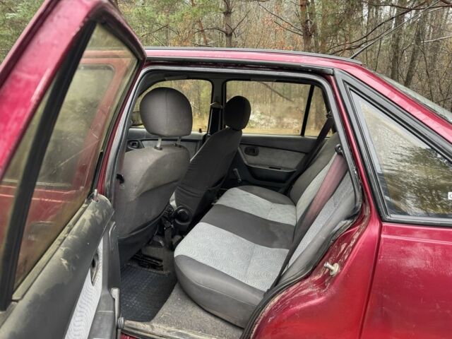 Червоний Деу Нексія, об'ємом двигуна 1.5 л та пробігом 150 тис. км за 1000 $, фото 10 на Automoto.ua