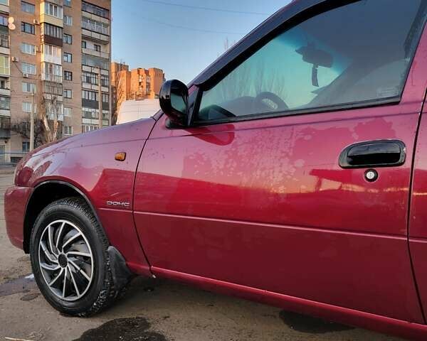 Красный Дэу Нексия, объемом двигателя 1.5 л и пробегом 290 тыс. км за 2100 $, фото 4 на Automoto.ua