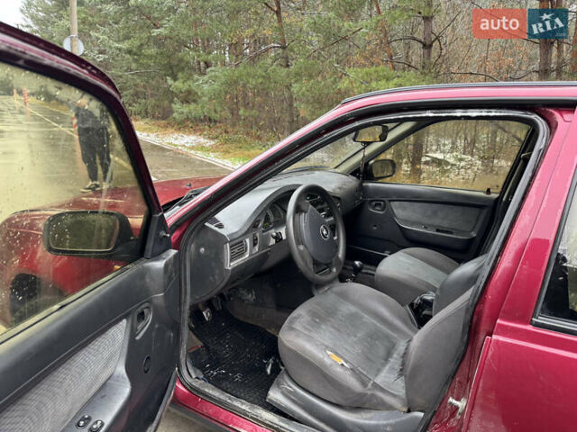 Червоний Деу Нексія, об'ємом двигуна 1.5 л та пробігом 150 тис. км за 1100 $, фото 7 на Automoto.ua