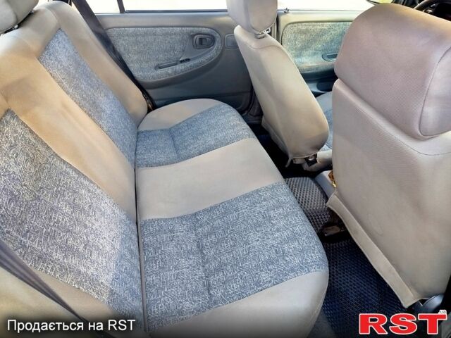 Красный Дэу Нексия, объемом двигателя 1.5 л и пробегом 320 тыс. км за 1500 $, фото 7 на Automoto.ua