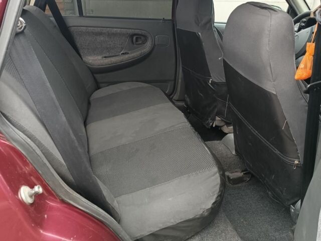 Червоний Деу Нексія, об'ємом двигуна 1.5 л та пробігом 111 тис. км за 1400 $, фото 5 на Automoto.ua