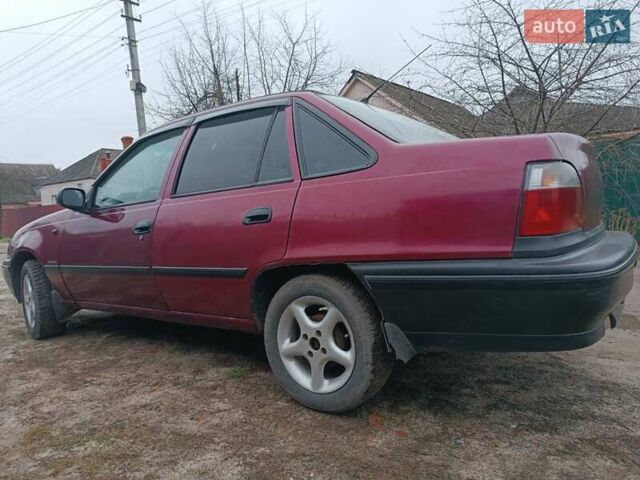 Червоний Деу Нексія, об'ємом двигуна 1.5 л та пробігом 111 тис. км за 1400 $, фото 2 на Automoto.ua