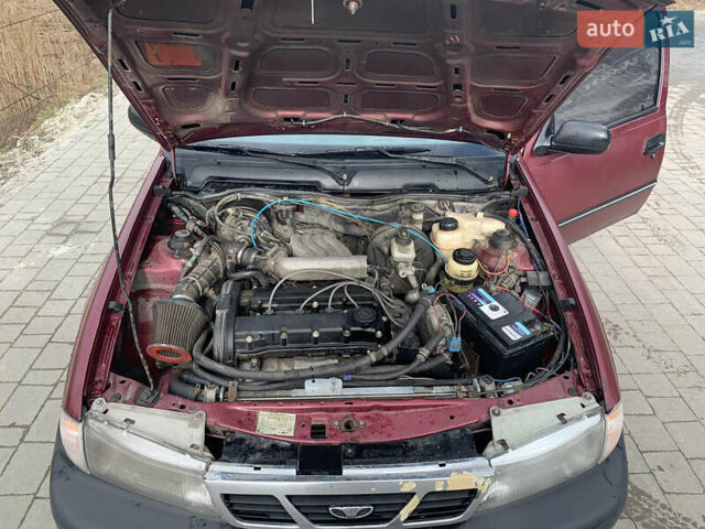 Червоний Деу Нексія, об'ємом двигуна 1.5 л та пробігом 305 тис. км за 1450 $, фото 5 на Automoto.ua
