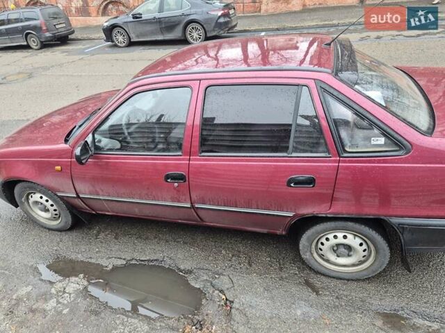 Червоний Деу Нексія, об'ємом двигуна 1.5 л та пробігом 137 тис. км за 900 $, фото 13 на Automoto.ua