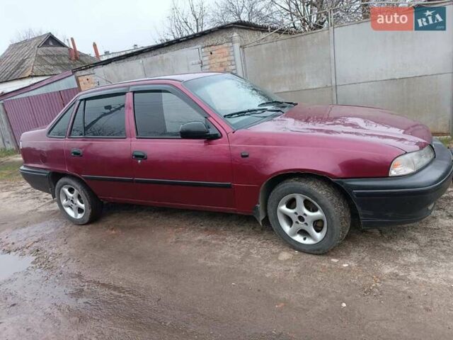 Червоний Деу Нексія, об'ємом двигуна 1.5 л та пробігом 111 тис. км за 1400 $, фото 8 на Automoto.ua