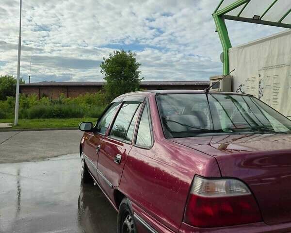 Деу Нексія 2008 у Конотопе на Automoto.ua Червоний Деу Нексія, об'ємом двигуна 1.5 л та пробігом 148 тис. км за 2100 $, фото 9 на Automoto.ua