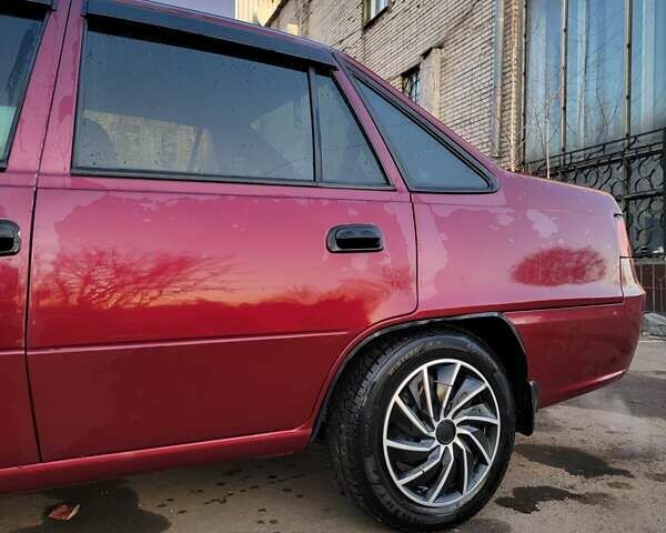 Красный Дэу Нексия, объемом двигателя 1.5 л и пробегом 290 тыс. км за 2100 $, фото 5 на Automoto.ua