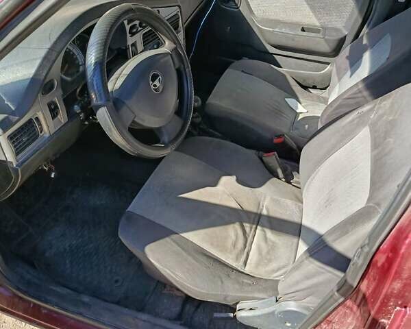 Червоний Деу Нексія, об'ємом двигуна 1.6 л та пробігом 319 тис. км за 1250 $, фото 4 на Automoto.ua