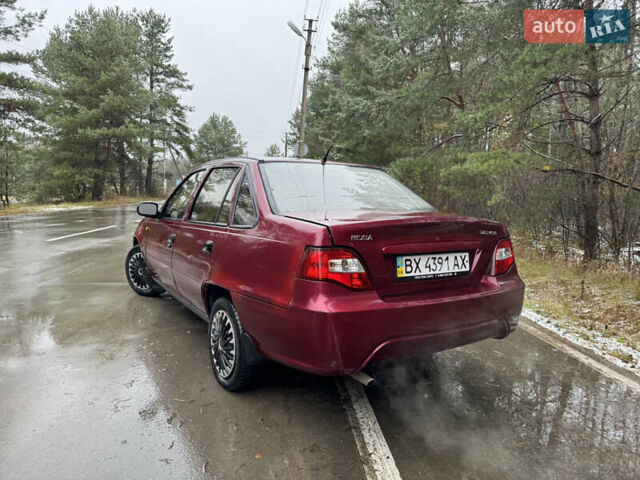 Червоний Деу Нексія, об'ємом двигуна 1.5 л та пробігом 150 тис. км за 1100 $, фото 11 на Automoto.ua