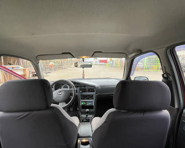 Красный Дэу Нексия, объемом двигателя 1.5 л и пробегом 211 тыс. км за 3250 $, фото 14 на Automoto.ua