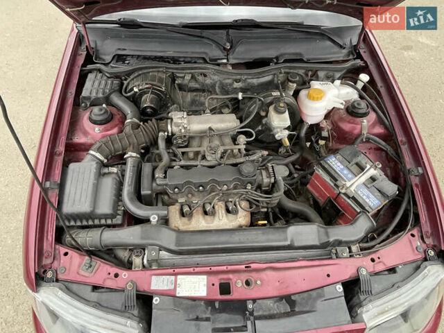 Красный Дэу Нексия, объемом двигателя 1.5 л и пробегом 211 тыс. км за 3250 $, фото 6 на Automoto.ua