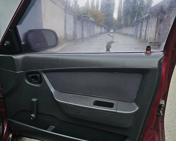 Червоний Деу Нексія, об'ємом двигуна 1.5 л та пробігом 200 тис. км за 900 $, фото 18 на Automoto.ua