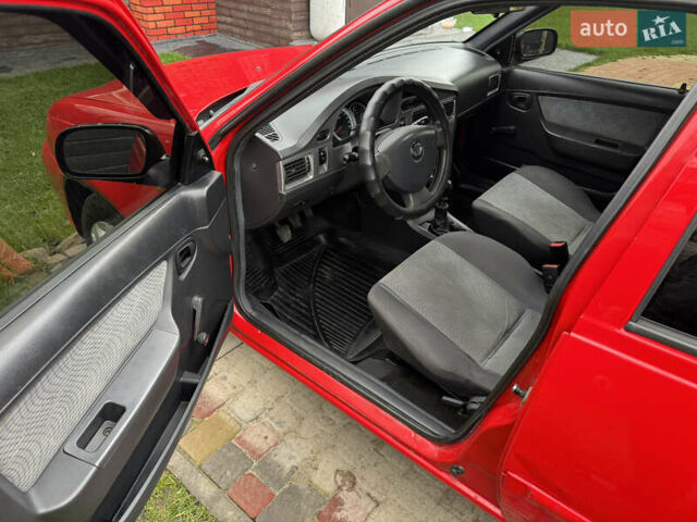Красный Дэу Нексия, объемом двигателя 1.6 л и пробегом 136 тыс. км за 2900 $, фото 9 на Automoto.ua