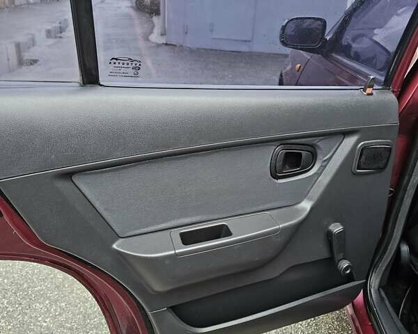 Червоний Деу Нексія, об'ємом двигуна 1.5 л та пробігом 200 тис. км за 900 $, фото 10 на Automoto.ua