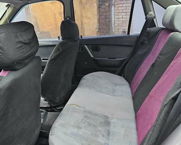 Червоний Деу Нексія, об'ємом двигуна 1.5 л та пробігом 200 тис. км за 900 $, фото 14 на Automoto.ua