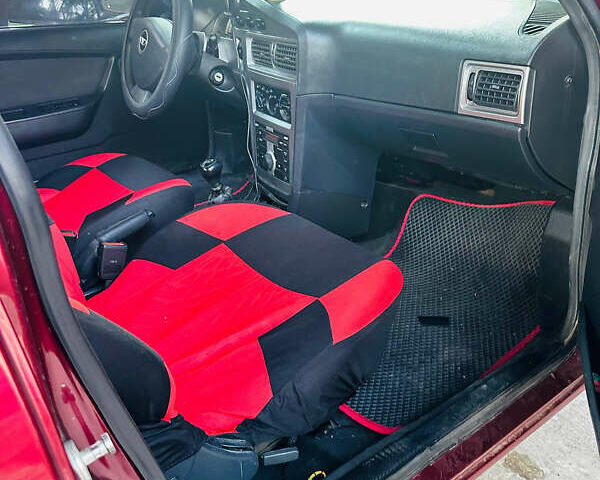 Червоний Деу Нексія, об'ємом двигуна 1.6 л та пробігом 168 тис. км за 3000 $, фото 12 на Automoto.ua