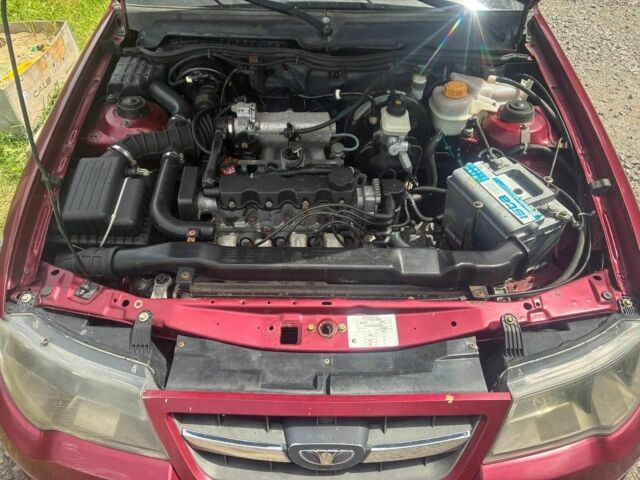 Червоний Деу Нексія, об'ємом двигуна 1.5 л та пробігом 118 тис. км за 2000 $, фото 5 на Automoto.ua